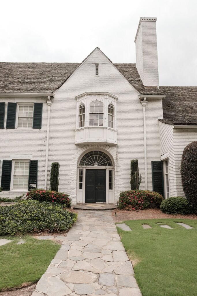 Illustrative photo: white residential exterior with crisp architectural trim